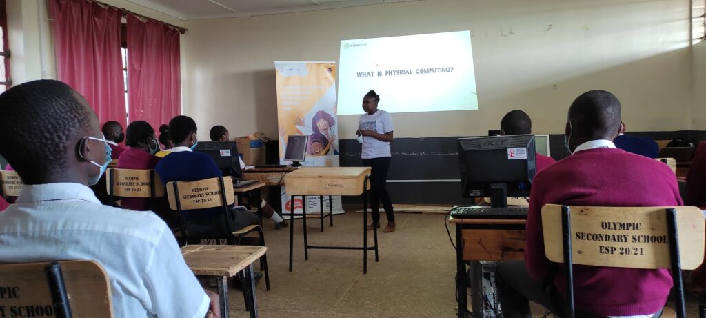 girl presenting to a class of students